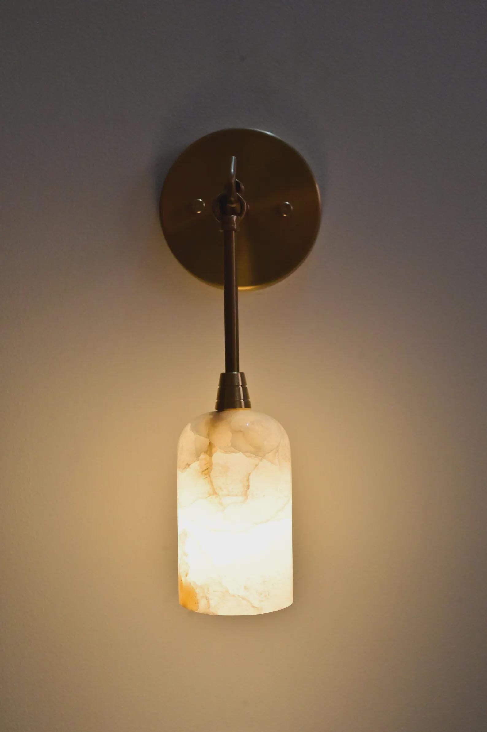Elegant Alabaster & Brass Wall Sconce Mid-Century Modern Light Ambient Glow for Luxury Interiors — photo 1