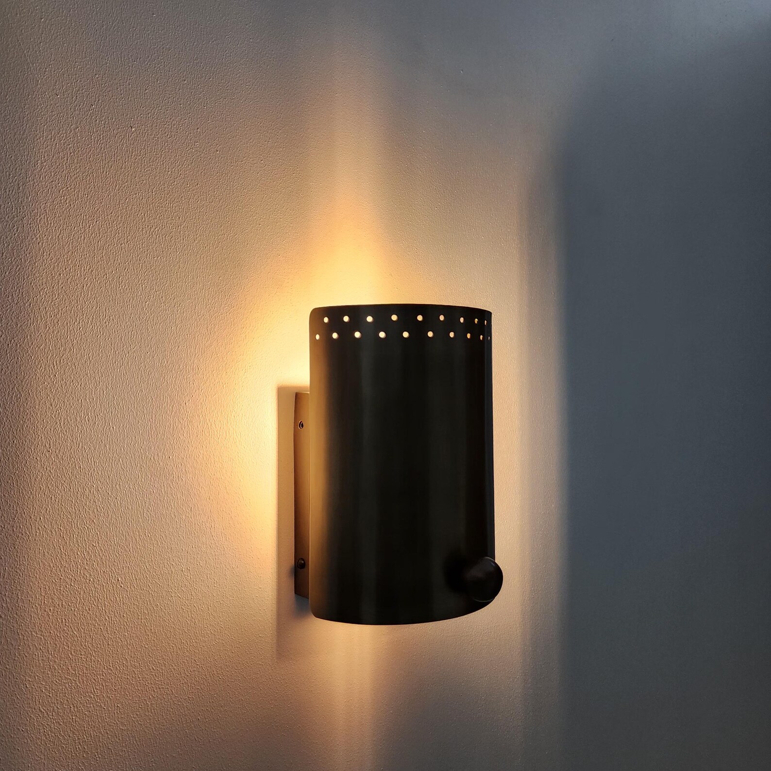 Handmade Brass wall sconce with custom curved disk — photo 1